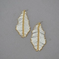 Handmade woven leaf drop earrings with white seed beads and golden axis detail - Gold Stud Earring Style