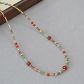 Dettaglio della collana di perle in agata rossa e turchese dal design retrò Dunhuang - Stile Perline Multicolore