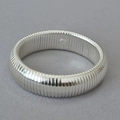Modern wide silver cuff bracelet featuring vertical textured ridges and polished metallic finish - Wide Version (Tubogas Style) / Silver