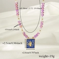 Detail of beaded purple heart necklace with blue Fatima Hand and Moon enamel pendant - Purple Heart Hamsa Hand Style (款式2)