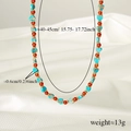 Detailed macro view of Evil Eye beaded necklace with turquoise hearts and orange agate beads - Blue Heart & Orange Bead Style (款式1)