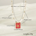 Hamsa Hand necklace with white heart beads and red enamel pendant in golden stainless steel - White Heart Stone Beads with Hamsa Hand Pendant Style
