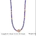 Close-up of beaded evil eye necklace with dimensions 41-46cm and 15g weight shown - Purple Style (Style 1)