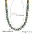 Dettaglio delle dimensioni della collana boho con dischi turchesi e perle metalliche dorate - Turchese Blu (Pino Blu-Collana)