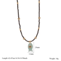Detailed view of fish-shaped green stone pendant with dimensions and black bead chain - Aventurine Jade