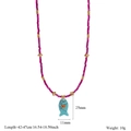 Detail of beaded fish necklace with turquoise stone pendant and size measurements - Turquoise