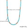 Detail van handgemaakte turquoise ketting met gouden afstandhouders en 40cm lengte - Style 3 (Hemelblauw Turquoise Schijf)