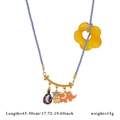 Dettaglio della collana stravagante con cordino blu e ciondoli luna, gufo ed elefante - Intrecciato Blu / Elefante Gufo Blu(C)