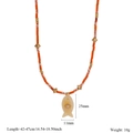Detail of beaded fish necklace with natural stone pendant and adjustable chain length - Yellow Stone