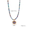 Detailed view of evil eye sun pendant on bohemian beaded necklace with size dimensions - Multicolor Square Beads Blue Eye Sun (Style 2)