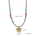 Detail of beaded evil eye heart necklace with turquoise stones and dimensions text - Mixed Stone Heart Blue Eye (Style 3)