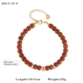 Gold stainless steel bracelet with red natural stones and sparkling crystal accents - Red Stone Style (13-33-4)