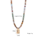 Detail of beaded necklace with celestial pendant showing 40+5cm length and dimensions - Style 1