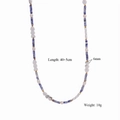 Dettaglio della collana fatta a mano con occhio di tigre, perle e un cuore marmorizzato - Perline a Cuore Marmo (Style 4)