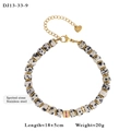 Golden stainless steel bracelet with dalmatian jasper beads and sparkling spacer accents - Dalmation Stone Style (13-33-9)