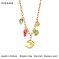 Dettaglio della collana in acciaio con ciondoli a delfino, margherita e conchiglia - Catena Sottile Dorata con Delfino ed Elementi Marini (10-8-002)