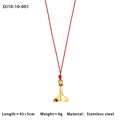 Macro view of gold-plated stainless steel fishtail pendant on red braided cord necklace - Whale Tail Pendant Red Rope Style (10-10-001)