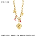 Detail of gold stainless steel necklace with heart, star and boot charms on white background - Multi-Pendant Heart Starfish Gold Chunky Chain Style (10-21-002)