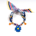 Detail of colorful silk scarf necklace with golden beads and a blue knit daisy charm - Pink Floral Daisy Style (11-03-6)