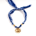 Macro detail of bohemian fabric necklace with blue paisley print and golden sun pendant - Paisley Sun Pendant Style (11-03-3)