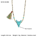 Collana boho con testa di lupo in turchese blu, perle maculate e dettagli in acciaio - Turchese Blu Testa di Lupo (10-34-004)