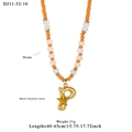 Ocean style beaded necklace with orange stone beads and gold letter P starfish pendant - Letter P