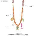 Beaded ocean necklace with orange stones, fish charms, and gold initial R pendant - Letter R