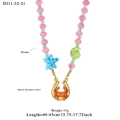Pink and green beaded ocean necklace with crab pendant and starfish shell charms - Letter U