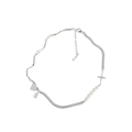 Collana in argento S925 con ciondoli a cuore, perla e stella su sfondo bianco - Argento 925 / Oro Bianco