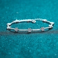 Elegant 925 sterling silver star bracelet featuring micro-pave moissanite stones and adjustable chain - 1 Carat Moissanite / 925 Silver
