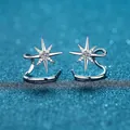 Clips d'oreilles étoile en argent 925 avec pavé scintillant sur fond bleu mat - Argent 925 / 0,28 Carat Moissanite (Argent)