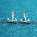 S925 sterling silver four-prong stud earrings with moissanite smile pendant on glittery background - 925 Silver / 119.2 Points Moissanite