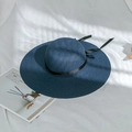 Detailed texture of dark blue woven straw hat with elegant black satin ribbon detail - M (56-58cm) / Navy Blue