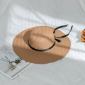 Detail of summer straw hat texture with elegant black ribbon bow and wide brim design - M (56-58cm) / Light Coffee