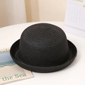 Close-up of black straw sun hat with roll-up brim and intricate spiral weave texture - Adult size 56-58cm / Black