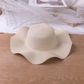 Classic beige wide brim straw hat with elegant wavy edge for summer sun protection - M (56-58cm) / Beige