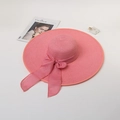 Detailed texture of pink woven straw hat with elegant ribbon bow for sun protection - M (56-58cm) / Pink