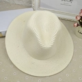 Classic cream woven straw sun hat with wide brim in a stylish Panama Fedora design - M (56-58cm) / Cream