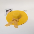 Bright yellow wide brim straw hat with matching ribbon bow and woven texture - M (56-58cm) / Yellow