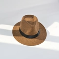Detail of classic straw fedora hat featuring woven texture and black ribbon under sunlight - L (58-60cm) / Coffee