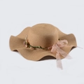 Detail of a khaki straw hat with pink flowers and a chiffon bow ribbon for beach sun protection - M / Khaki