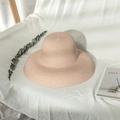 Elegant pink Audrey Hepburn style woven straw sun hat for women on white fabric - M (56-58cm) / Flesh Pink