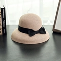 Detail of elegant khaki straw hat with a black ribbon bow on a dark wooden surface - M (56-58cm) / Flesh Pink