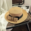 Detailed close-up of natural straw boater hat with black ribbon and metal M letter logo - M (56-58cm) / Khaki