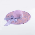 Light purple woven straw sun hat with decorative ribbon and wide brim for women - M (56-58cm) / Purple