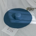 Detail of dark blue wide brim straw hat with fine weave texture on white checkered fabric - M (56-58cm) / Navy Blue