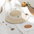 Close-up of beige straw sun hat featuring white fringe ribbon and a gold M metal logo - M (56-58cm) / Off White