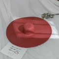 Macro shot of large red woven straw hat with wide brim showing detailed spiral texture - M (56-58cm) / Burgundy