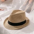 Detailansicht der Strohstruktur und des schwarzen Bandes an diesem Vintage-Fedora-Hut - M(56-58cm) / Rollrand