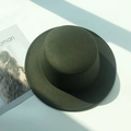 Detail of dark green wool felt boater hat with stitched brim on fashion magazine background - M (56-58cm) / Army Green